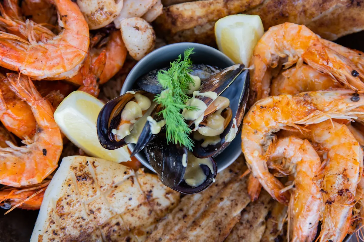 34 South Knysna seafood platter — grilled prawns, line fish, mussels and calamari with lemon