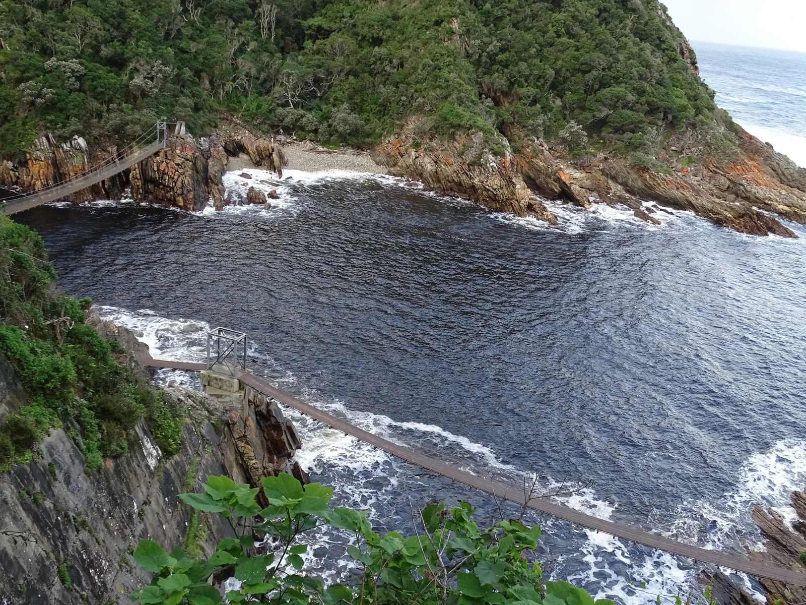 Storms River Suspension Bridge in Tsitsikamma — footbridges spanning the river gorge at the Indian Ocean