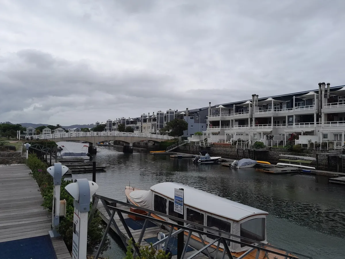 Thesen Islands, Knysna — colonial-style canal homes lining the tidal waterways inside Knysna Lagoon