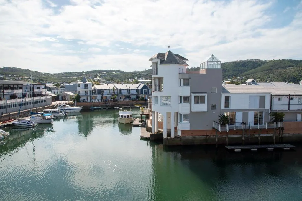 Waterfront apartment building with lagoon views and modern architecture in Knysna