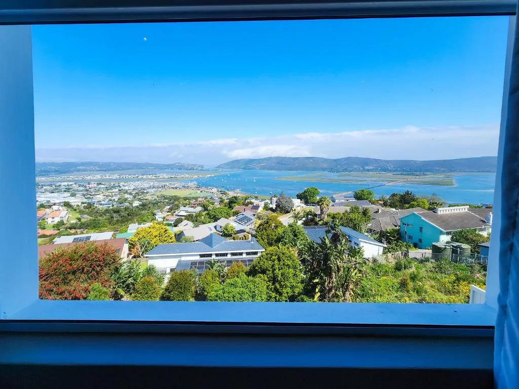 Panoramic lagoon and mountain vista from property window