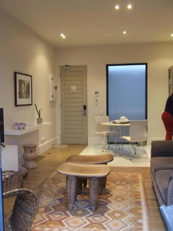 Modern living room with comfortable seating and contemporary decor throughout