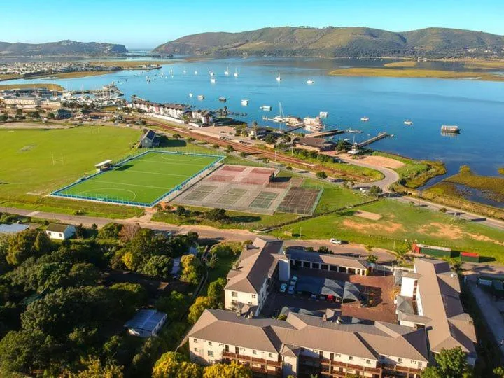 Aerial view of Knysna Heads lagoon with sailboats and green hills