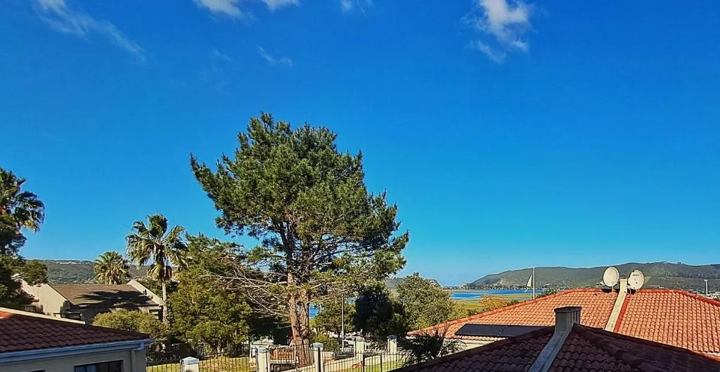 Scenic coastal view of Knysna lagoon and mountains from property rooftop