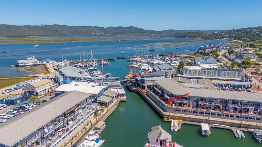 Scenic Knysna Waterfront marina with sailboats and blue lagoon waters