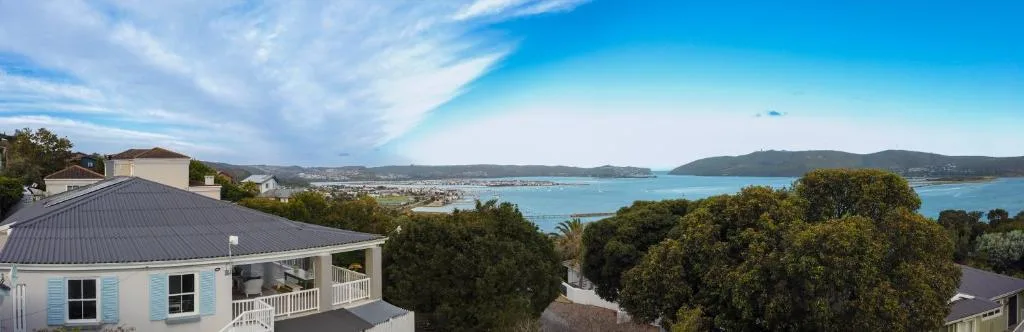 Panoramic lagoon and mountain vista from elevated property overlooking Knysna