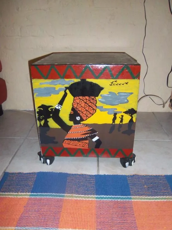 Colorful African-inspired storage chest with vibrant tribal patterns and designs