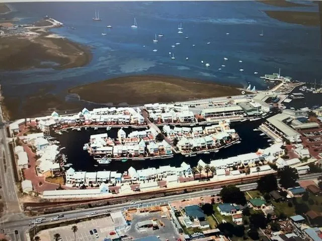 Aerial view of Knysna Heads with moored boats and waterfront development