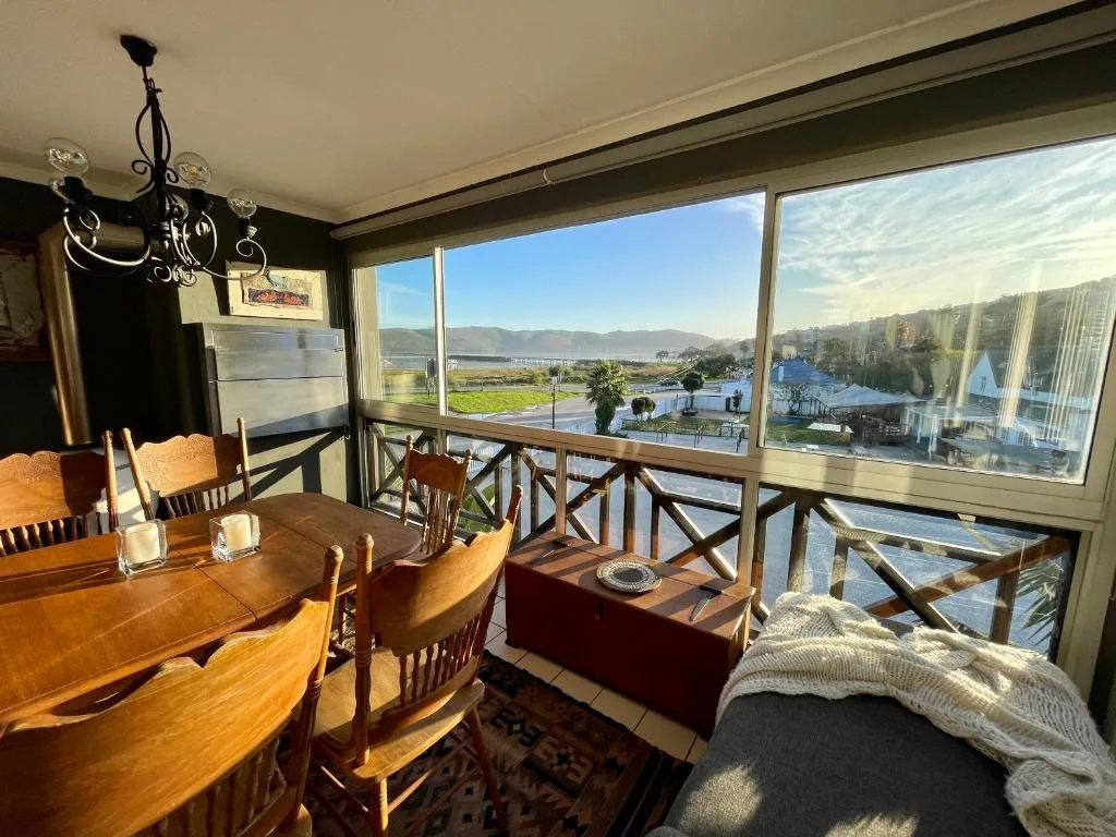 Lagoon and mountain views from spacious dining and lounge area with large windows