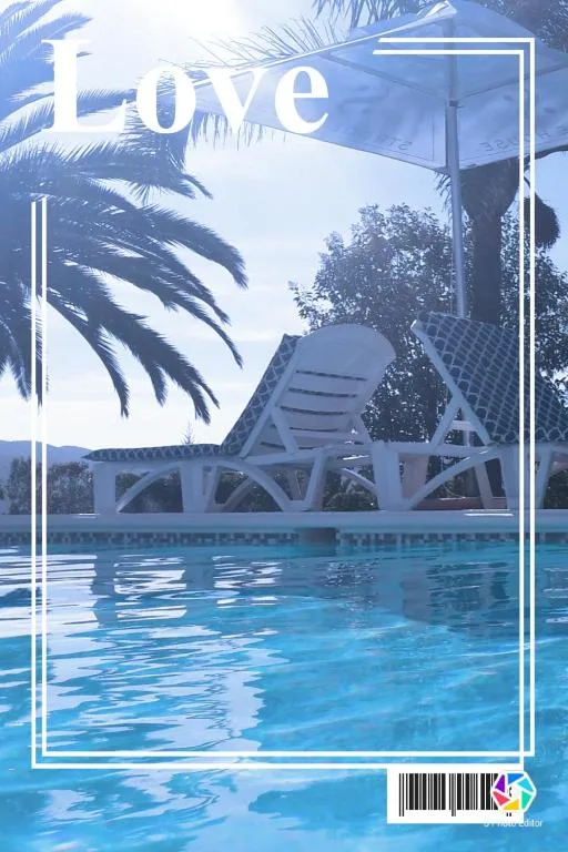Resort swimming pool with loungers, palm trees, and blue sky