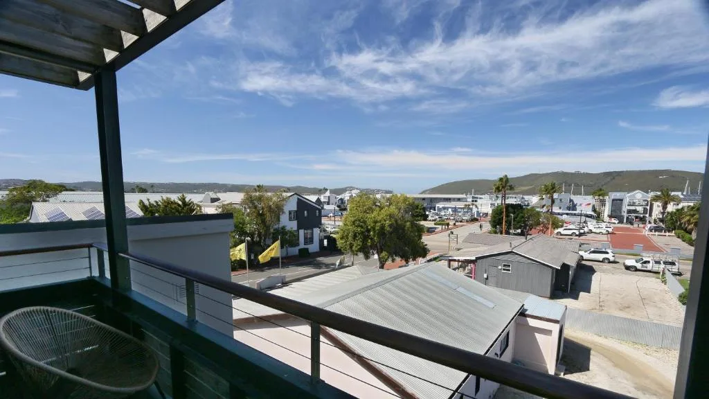 Elevated town views over Knysna with mountains and lagoon beyond