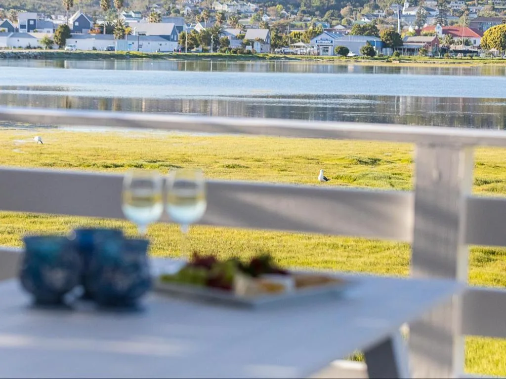 Lagoon and residential waterfront town viewed from a deck area