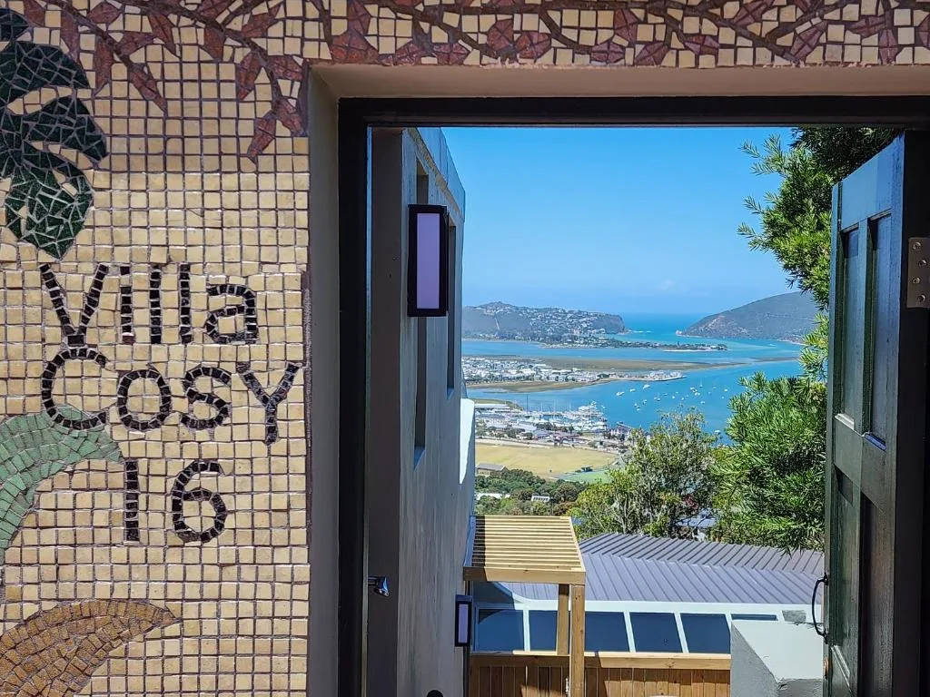 Scenic coastal view of Knysna lagoon and mountains from property doorway