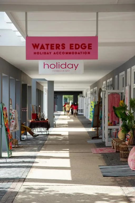 Bright covered walkway entrance to Waters Edge holiday accommodation in Knysna