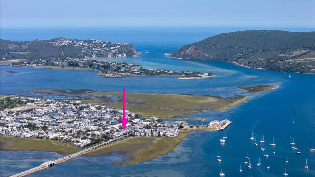 Aerial view of Knysna Heads, lagoon, and surrounding coastal landscape with boats
