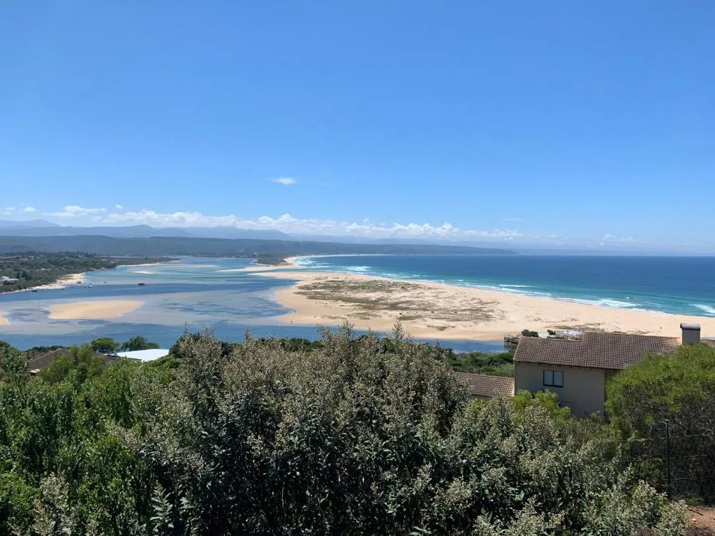 Expansive coastal view of Plettenberg Bay with pristine beaches and lagoon