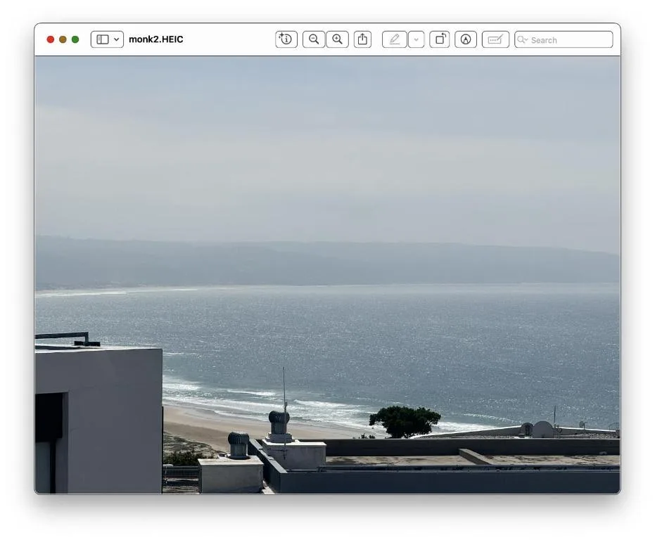 Ocean and beach view from property rooftop with modern architecture