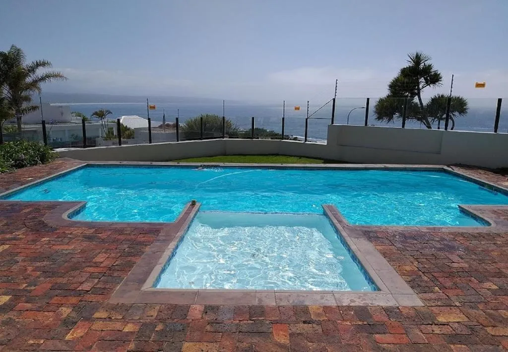 Swimming pool with ocean view overlooking Plettenberg Bay coast