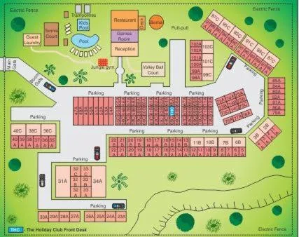Aerial site map showing property layout, parking, and accommodation units