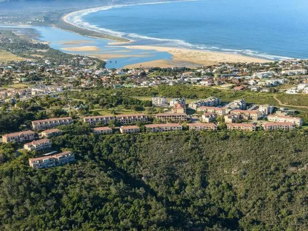Aerial view of Plettenberg Bay lagoon, beach, and coastal town landscape