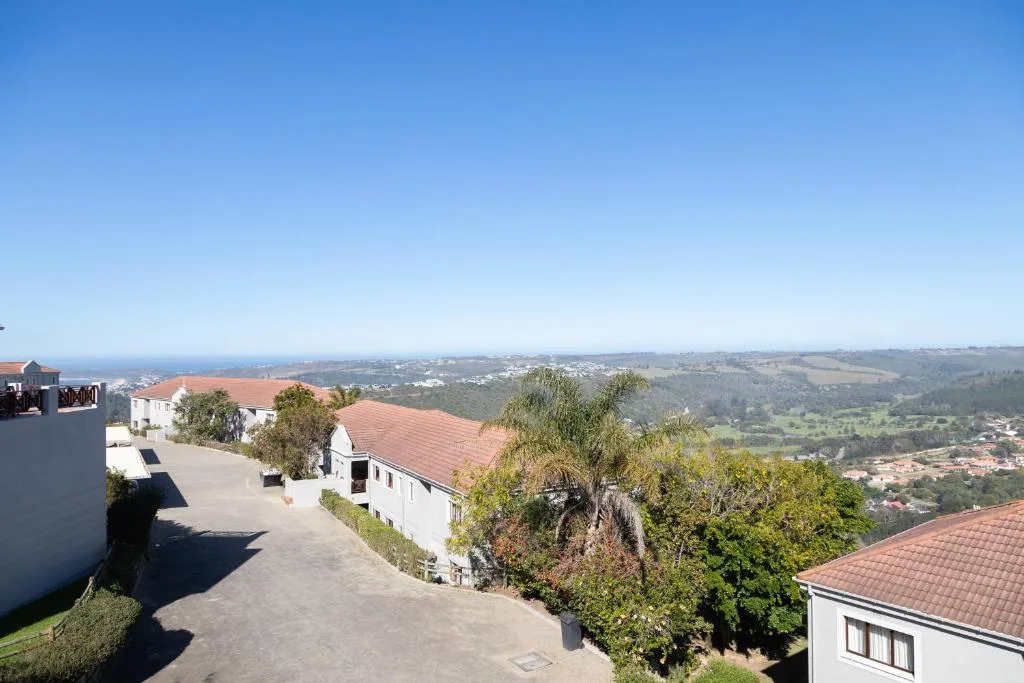 Expansive valley and coastal vista from elevated property overlooking Plettenberg Bay
