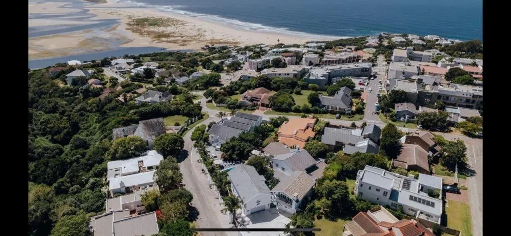 Aerial view of Plettenberg Bay coastal town with beach and ocean