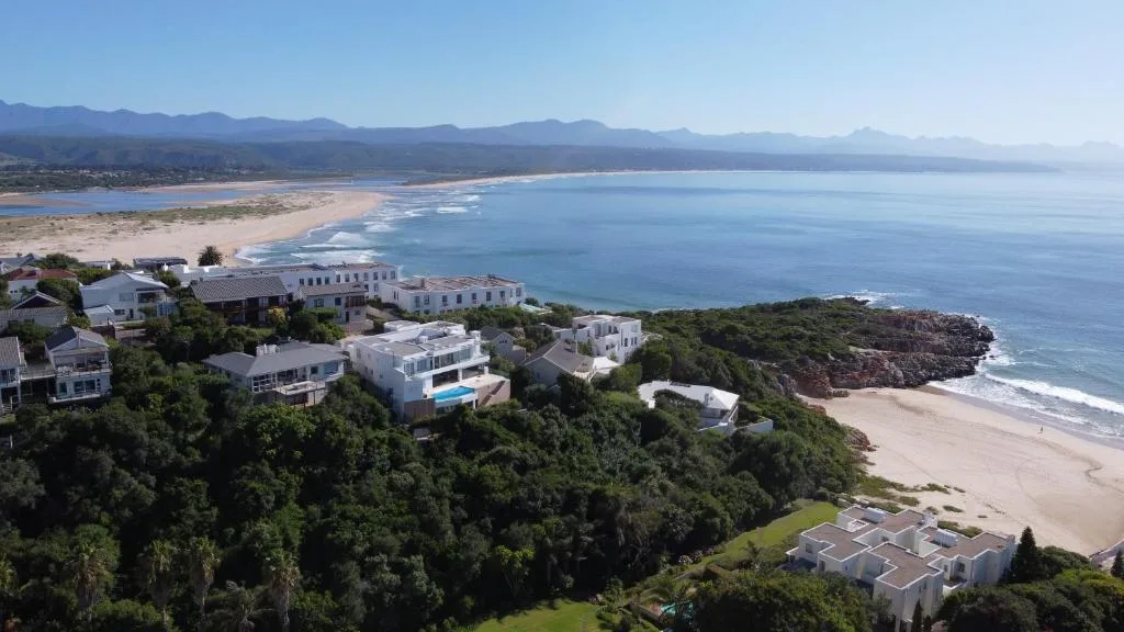 Coastal villa with panoramic ocean, beach, and mountain vistas