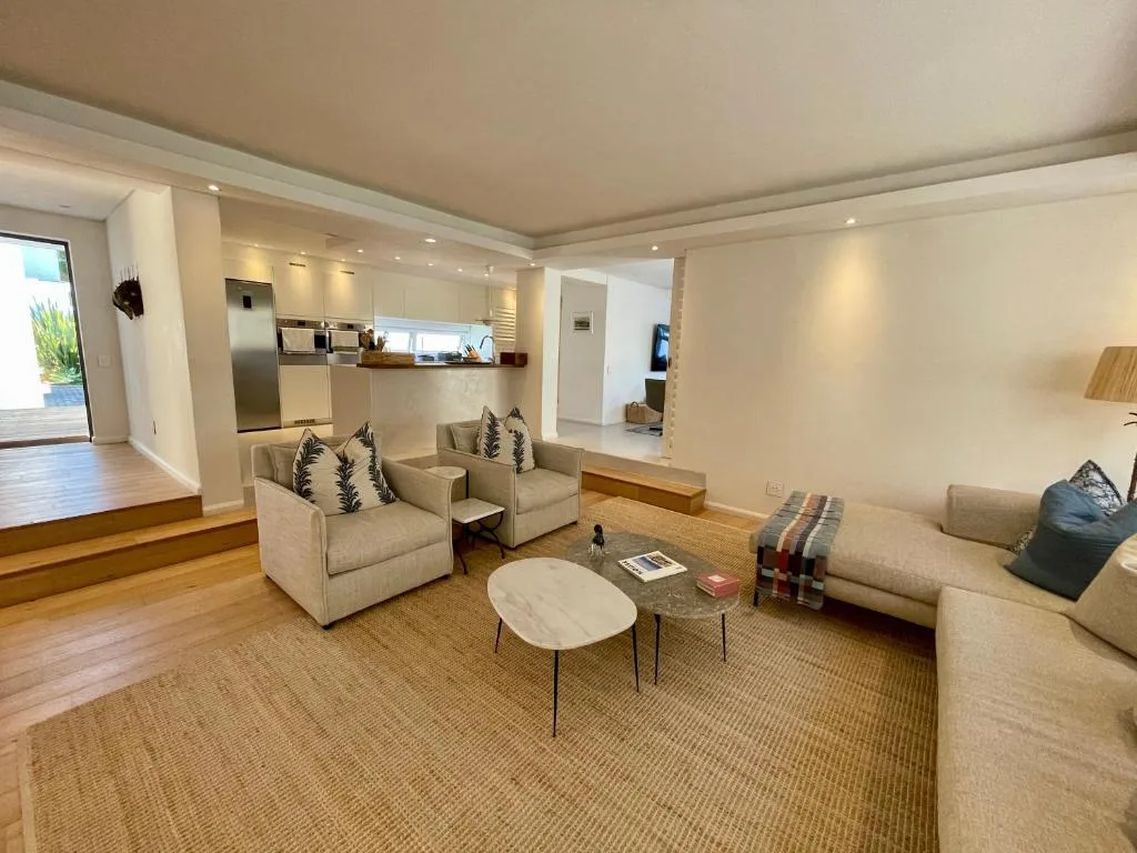 Spacious living room with neutral seating and modern coffee table