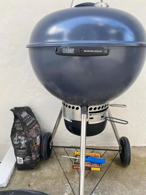 Weber charcoal braai grill with charcoal bag and starter materials