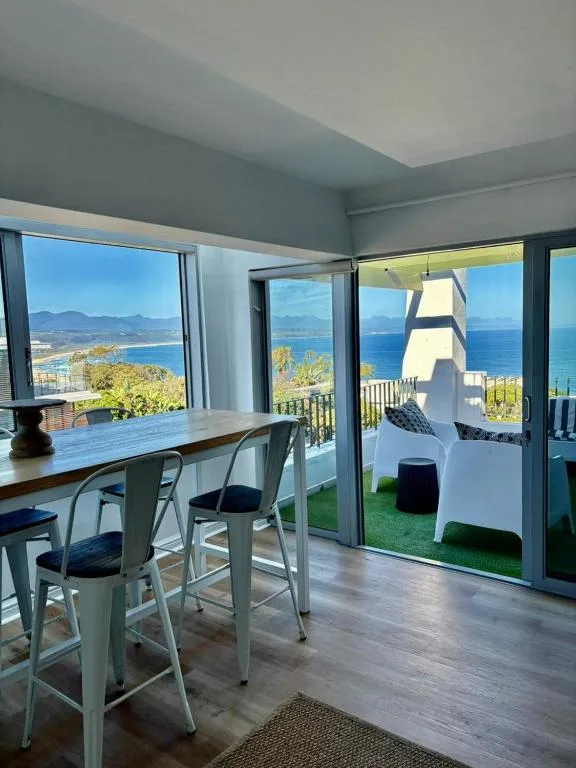 Coastal vista from dining area overlooking Plettenberg Bay and mountains
