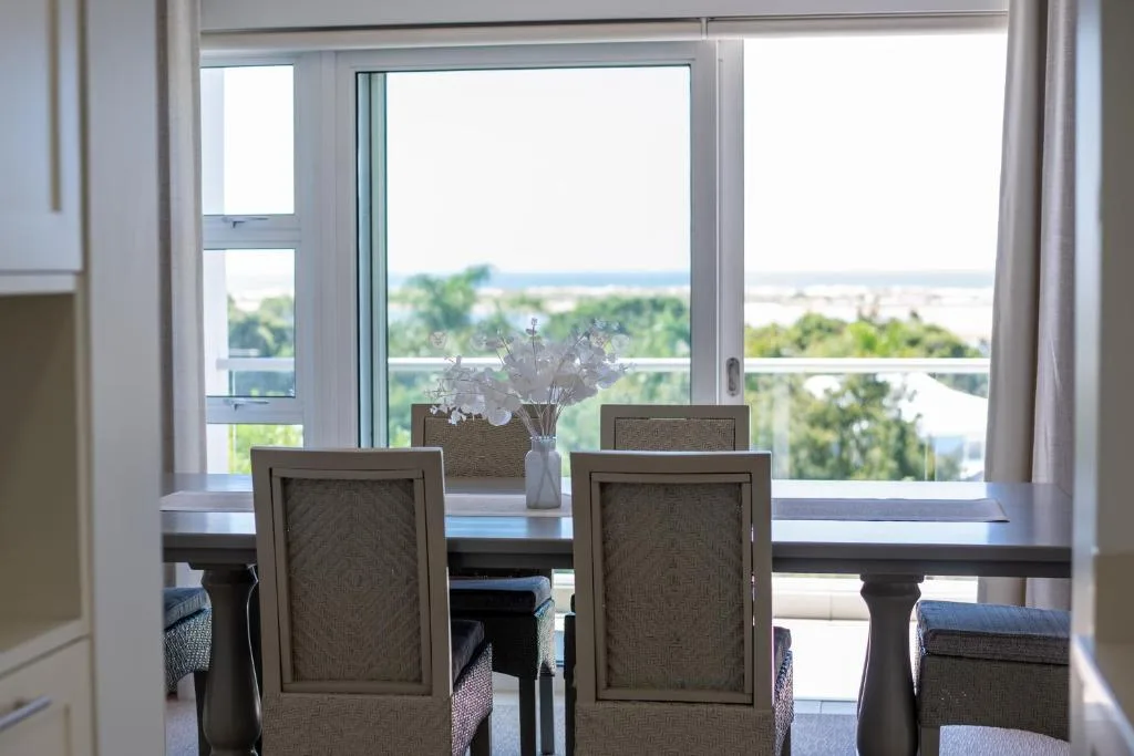 Scenic ocean and lagoon views from dining area through large windows