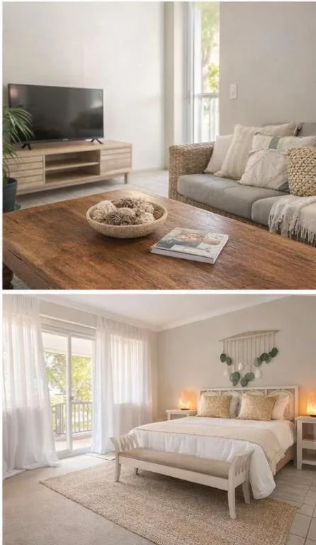 Modern living room with TV, wooden coffee table, and comfortable seating