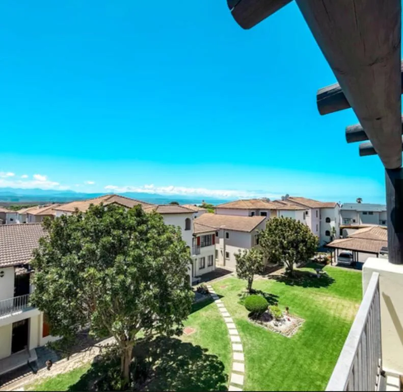 Scenic coastal view with mountains and ocean from elevated vantage point
