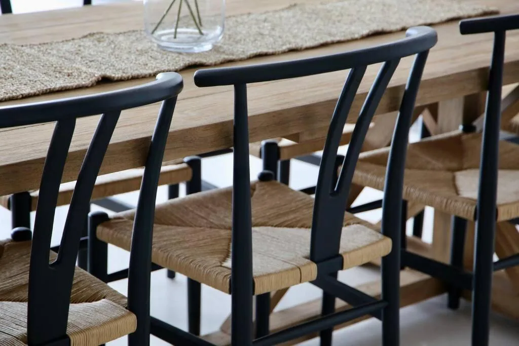 Modern dining chairs with woven seats at kitchen counter