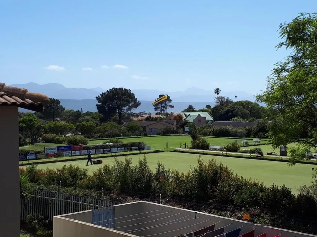 Scenic mountain and lawn views from property overlooking bowling green