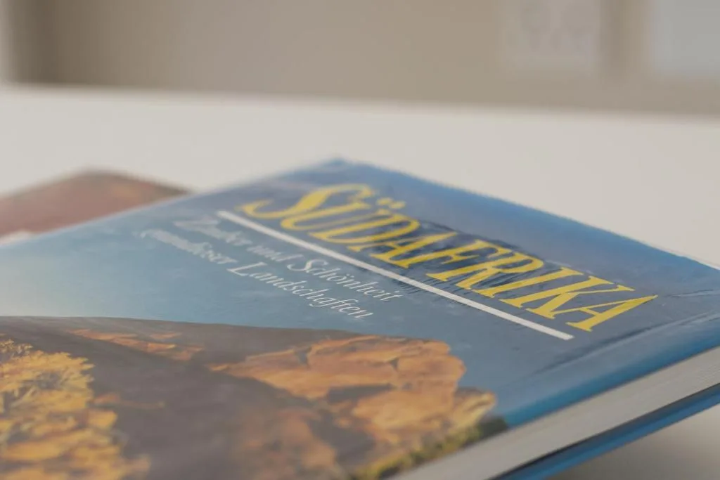 Close-up of a travel guide book about the Garden Route on a table