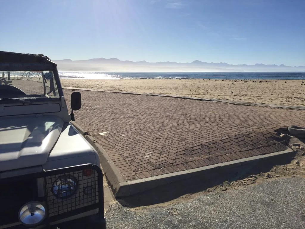 Scenic beach vista with mountains and ocean from property outlook
