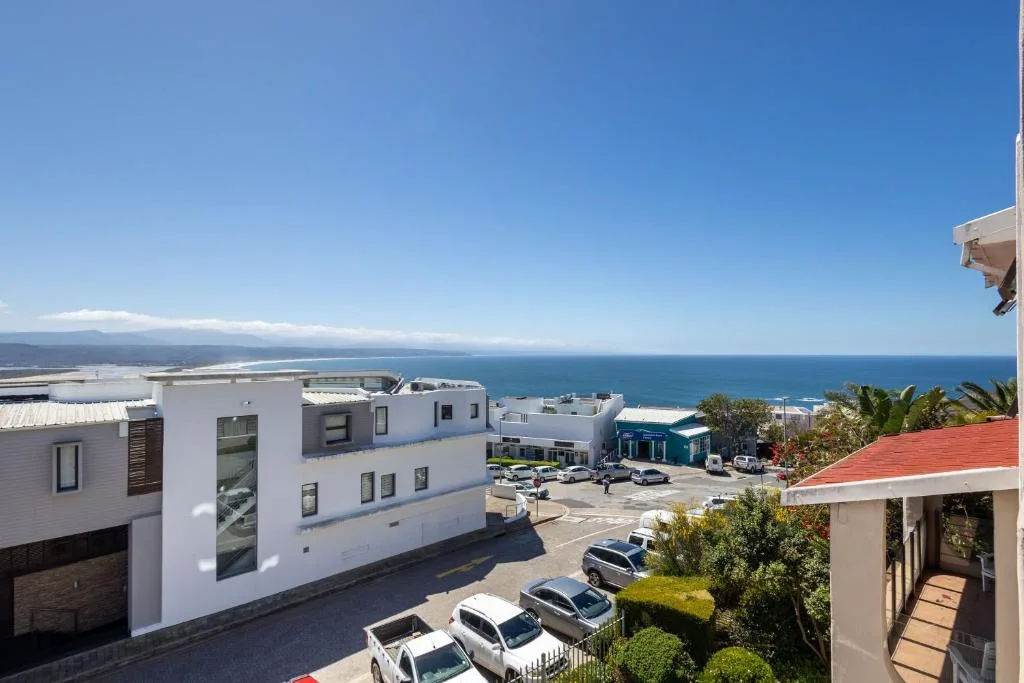 Expansive ocean and coastal vista from elevated property outlook