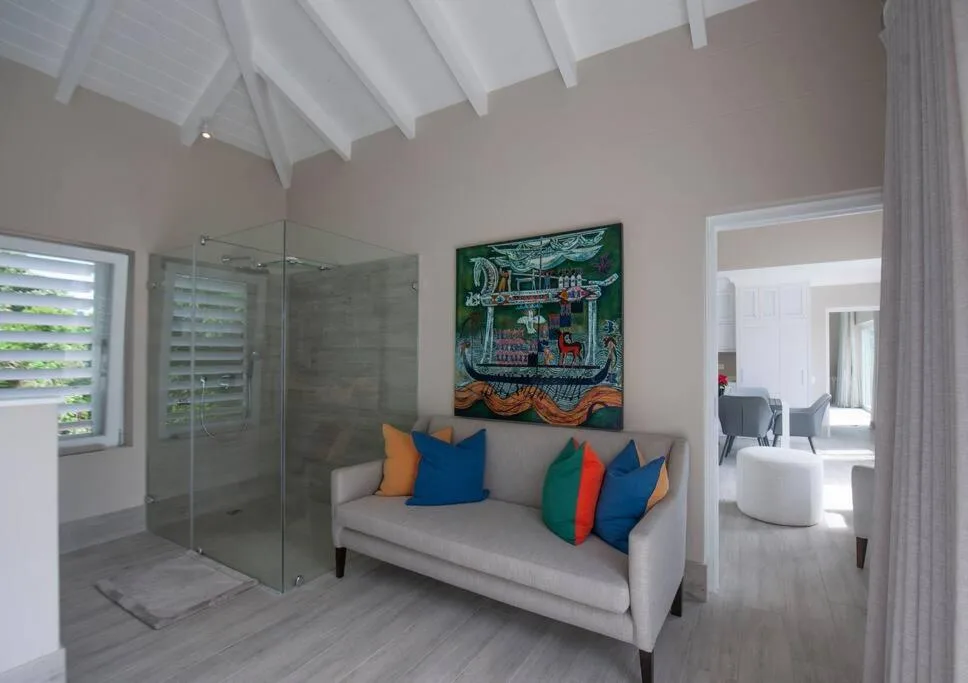 Modern bathroom with walk-in shower, soaking tub, and contemporary fixtures throughout