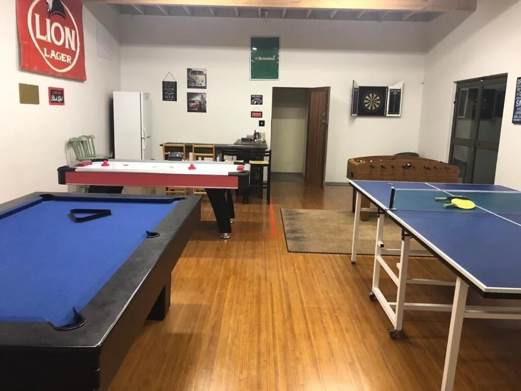 Games room with pool table, air hockey, and ping pong table