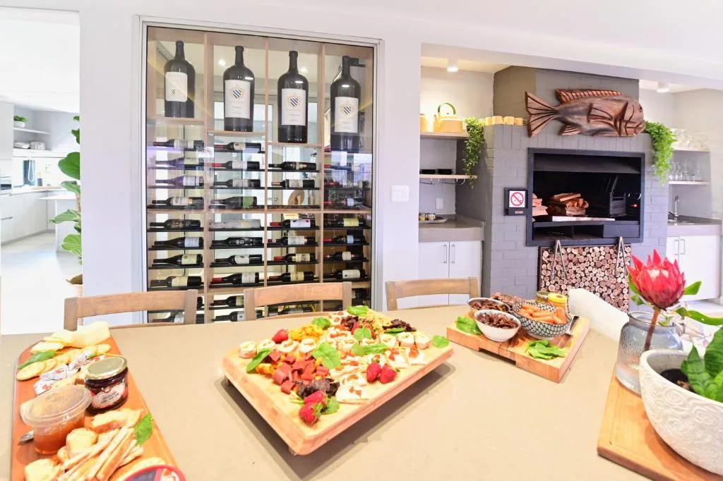 Gourmet charcuterie and wine display in modern kitchen setting