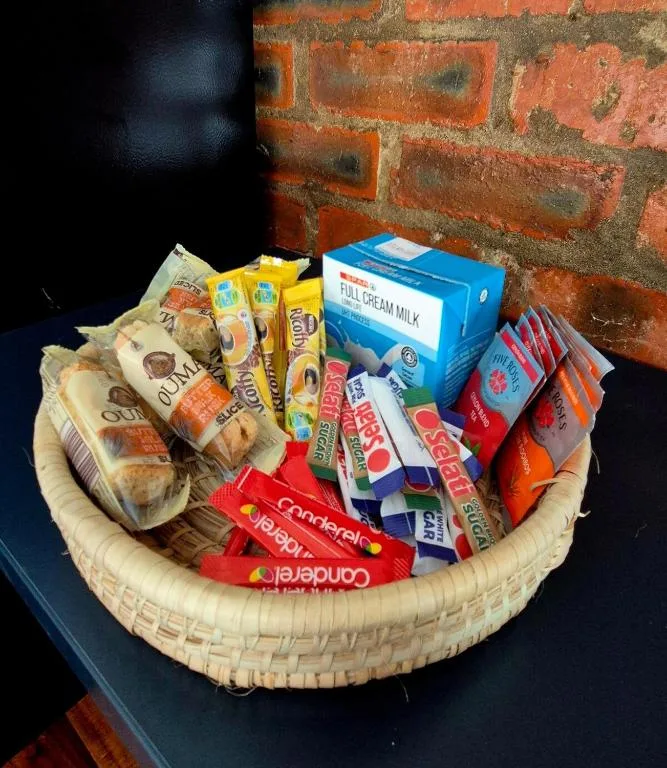 Welcome basket with artisan bread, milk, chocolate, and local treats