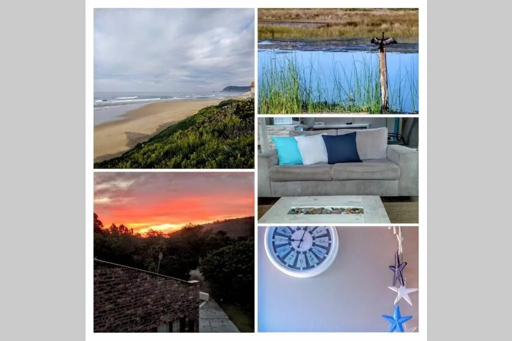 Scenic coastal beach view with golden sand and rolling green hills