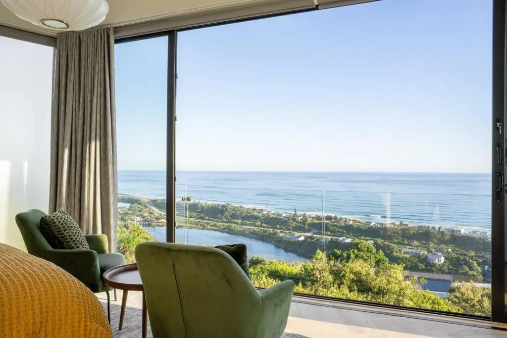 Ocean and lagoon vista from contemporary lounge window seating
