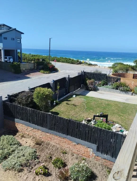 Ocean and beach vista from elevated property overlooking Wilderness coastline