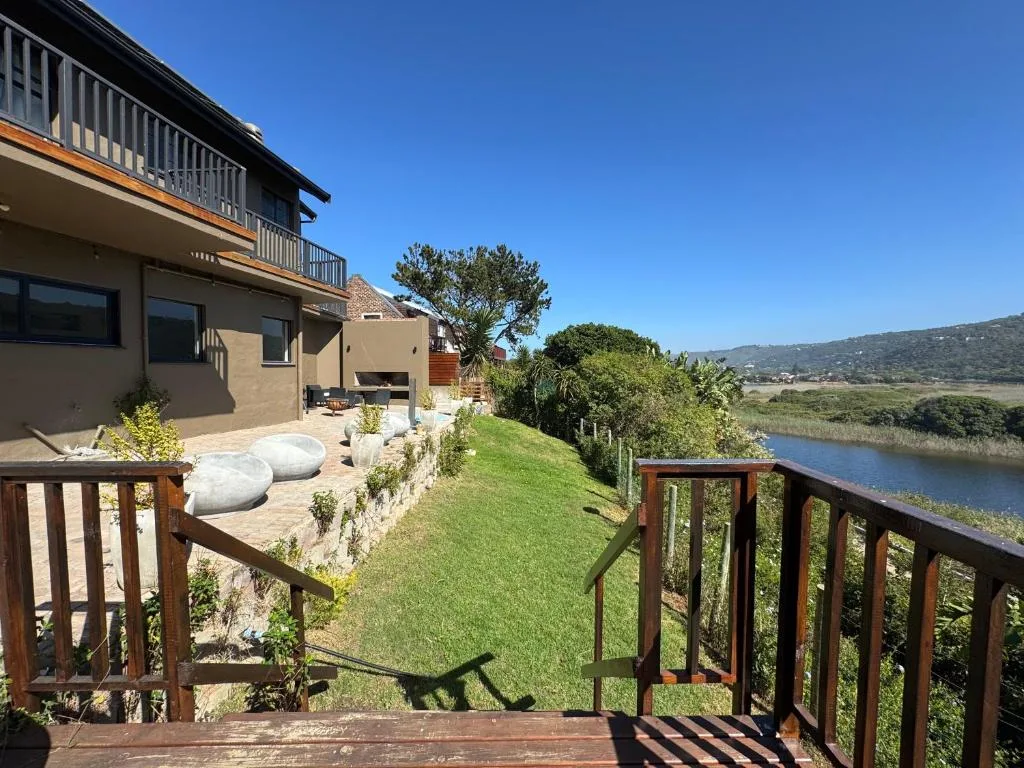 Lagoon and mountain landscape visible from property deck and gardens
