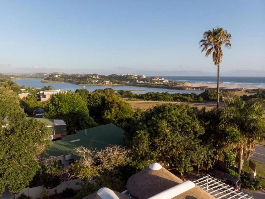 Scenic coastal lagoon and beach views from elevated property perspective