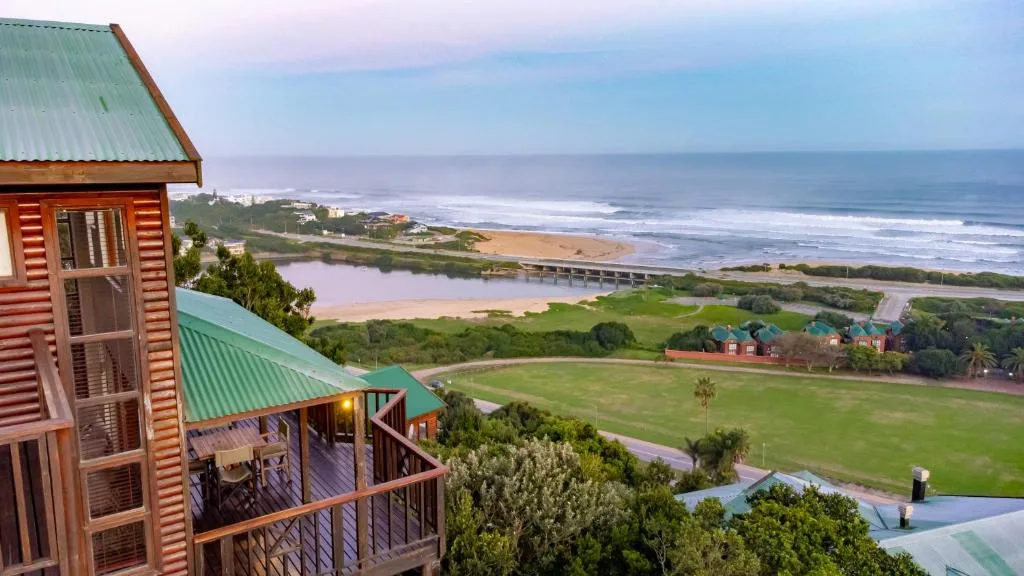 Panoramic coastal view with lagoon, beach, bridge and ocean from elevated deck