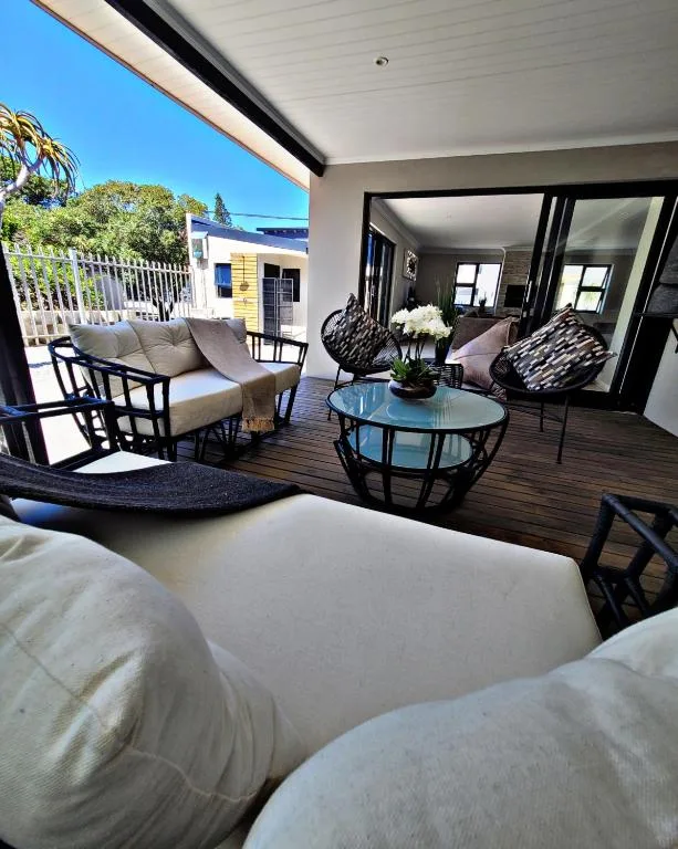 Spacious outdoor deck with comfortable seating and ocean views, Garden Route