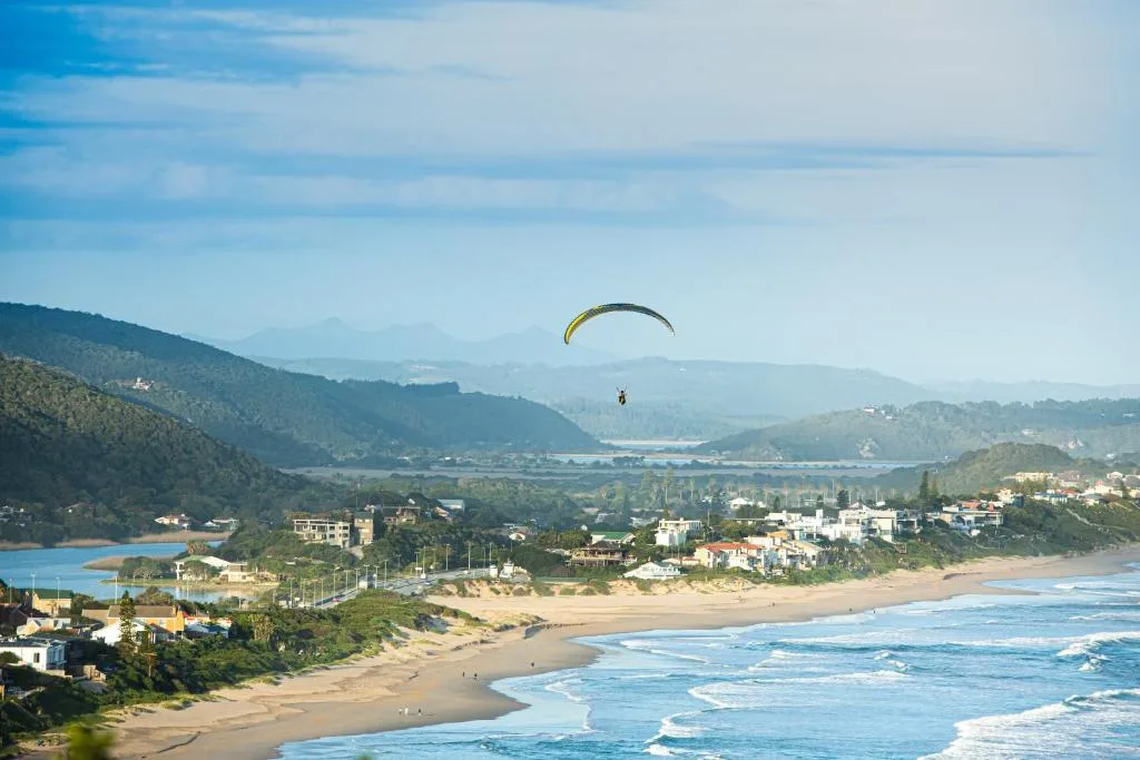 Panoramic coastal view of Wilderness beach, lagoon, and mountains